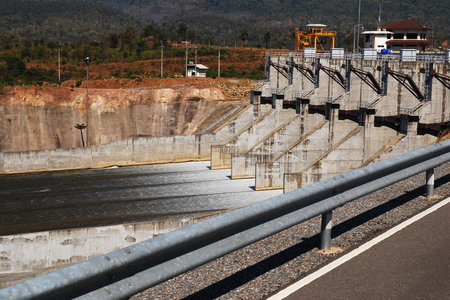 River dam and waterfall. Gates open. 