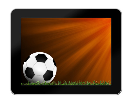 Football in green grass with background in tablet-pcの写真素材