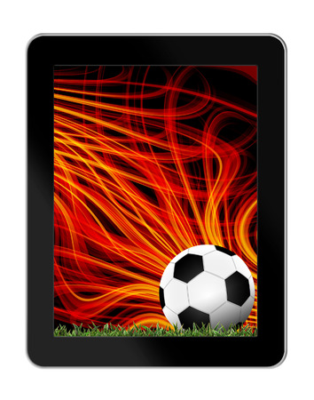 Football in green grass with background in tablet-pcの写真素材