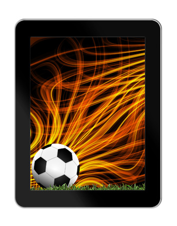 Football in green grass with background in tablet-pcの写真素材