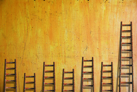 Old red wall damaged paintの写真素材