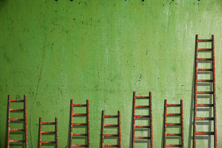 Old red wall damaged paintの写真素材
