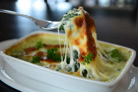 Baked spinach with cheeseの写真素材