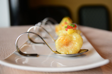 Deep-fried prawns with wasabi salad dressingの写真素材