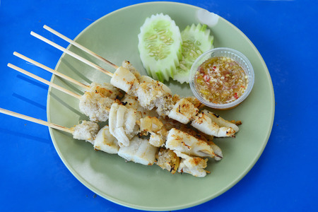 Thailand street food stir-fried squid eggs serve with seafood sauce.の写真素材
