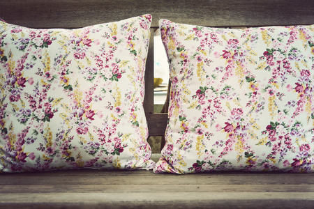 Pillow on wooden chair with vintage lookの写真素材