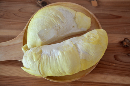 Durian the king of fruit on wooden plateの写真素材