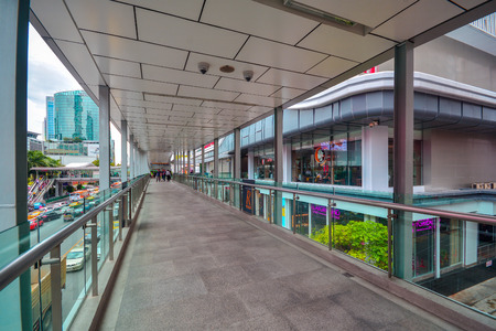 Bangkok, Thailand - October 25, 2018: Crowd People walking in the skywalk Bangkok, Thailand.のeditorial素材