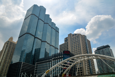 BANGKOK, THAILAND - October 25, 2018 - High buildings and public skywalk for transit between Chong Nonsi Bts Station with Sathorn junction  business area center.のeditorial素材