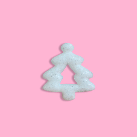 White glitter Christmas tree on pink background for new year and christmas background, Minimal Conceptの写真素材