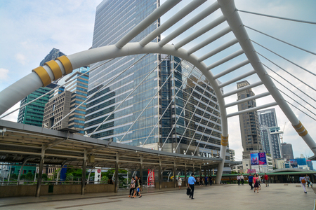 BANGKOK, THAILAND - October 25, 2018 - High buildings and public skywalk for transit between Chong Nonsi Bts Station with Sathorn junction  business area center.のeditorial素材