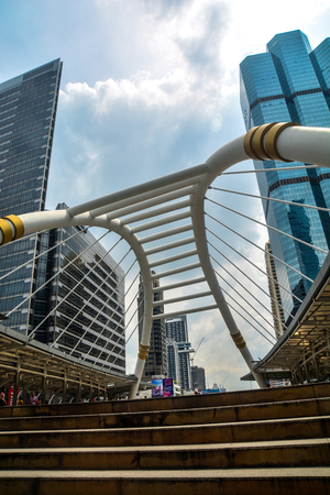 High buildings and public skywalk for transit between Chong Nonsi Bts Station with Sathorn junction  business area center.のeditorial素材