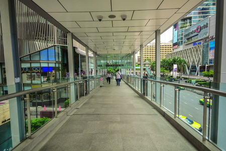 Bangkok, Thailand - October 25, 2018: Crowd People walking in the skywalk Bangkok, Thailand.のeditorial素材