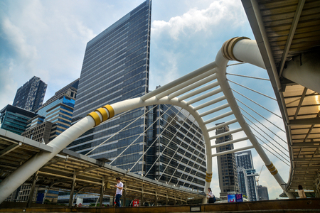 BANGKOK, THAILAND - October 25, 2018 - High buildings and public skywalk for transit between Chong Nonsi Bts Station with Sathorn junction  business area center.のeditorial素材