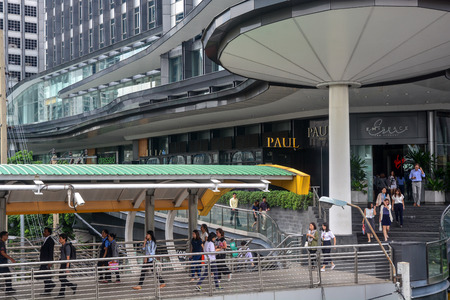 BANGKOK, THAILAND, October 25, 2018 - Business colleagues walking in a modern city, Sathorn, Bangkokのeditorial素材