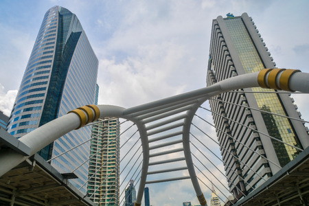 BANGKOK, THAILAND - October 25, 2018 - High buildings and public skywalk for transit between Chong Nonsi Bts Station with Sathorn junction  business area center.のeditorial素材