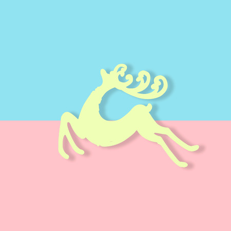 Christmas pink reindeer on pastel pink and blue background, Minimal christmas background, New year greeting cardの写真素材