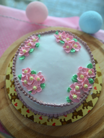 Cakes decorated with butter cream flowersの写真素材
