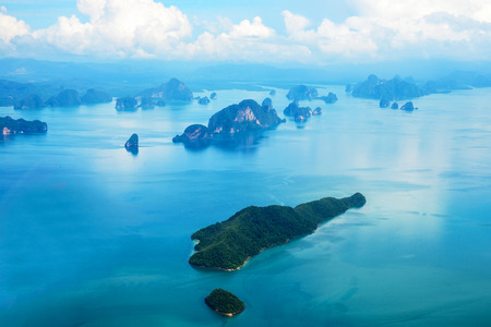 Tropical group of islands in Thailand as seen on window through window of an aicraft. Top viewの写真素材