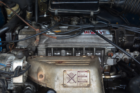 Closeup of mechanic repairing car, Mechanic Car Service in automobile garage auto car and vehicles service mechanical engineering.の写真素材