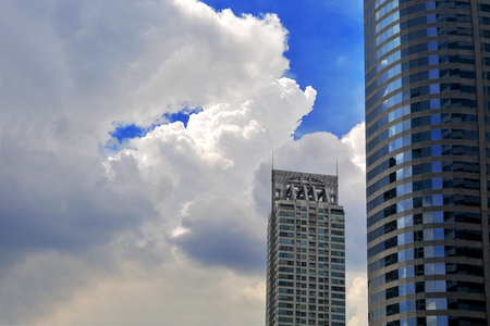 Windows of Skyscraper Business Office with blue sky, Corporate building in Bangkok city.の写真素材