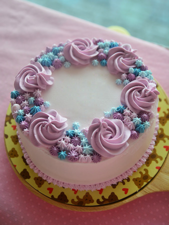 Cakes decorated with butter cream flowersの写真素材