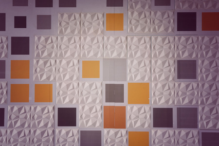 Abstract ceramic wall tiles in the shape of pyramid background.の写真素材
