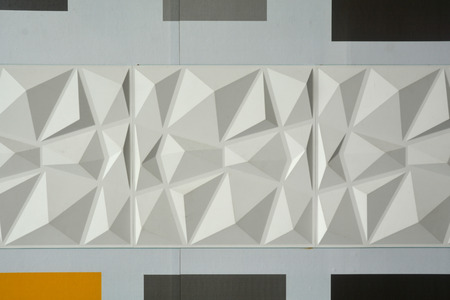 Abstract ceramic wall tiles in the shape of pyramid background.の写真素材