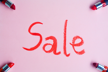 Set of red lipstick drawing Sale isolated on pastel background, Minimal makeup fashion concept.の写真素材