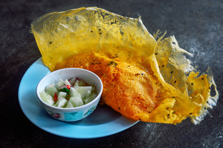 Vietnamese stuffed crispy omelette. with sliced cucumber and onion in vinegar, local authentic style, healthy Asian food conceptの写真素材