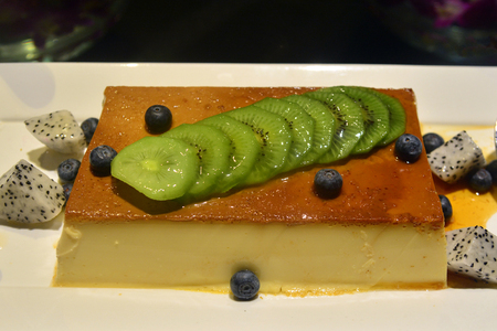 Chocolate and fruit cake on a luxury all you can eat buffet in a hotel, assorted sweet flour dessert, cakes, in a cafe, bar, hotel restaurant or hotel.の写真素材