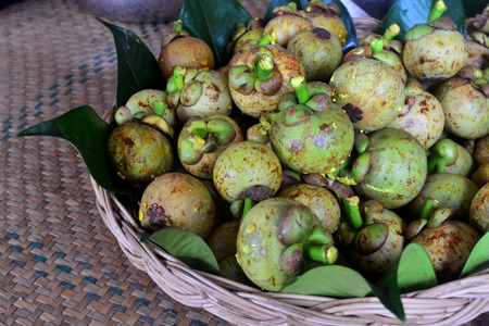 Fresh mangosteen fruit for sale in a market, Mangosteen background, Fruit backgroundの写真素材