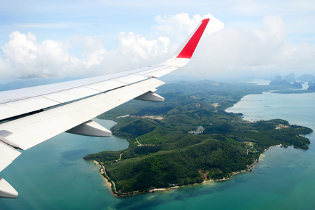 Tropical group of islands in Thailand as seen on window through window of an aicraft. Top viewの写真素材