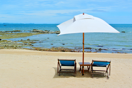 Beach chair and umbrella on idyllic tropical sand beach. Phuket, Thailandの写真素材