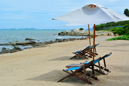 Beach chair and umbrella on idyllic tropical sand beach. Phuket, Thailandの写真素材