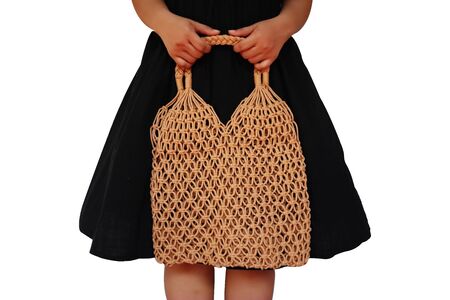 Young woman holding Reusable string shopping eco mesh bag Isolated on wgite background. Concept no plastic, zero waste and eco frendly.の写真素材