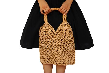 Young woman holding Reusable string shopping eco mesh bag Isolated on wgite background. Concept no plastic, zero waste and eco frendly.の写真素材