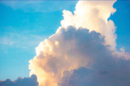 Beautiful blue sky and white cloud background on a bright day.