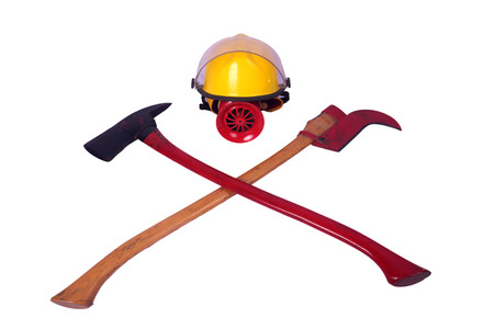 retro yellow helmet and red axes for fireman work の写真素材