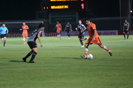 BANGKOK,THAILAND-March 8  Thai Premier League between Sisaket F C  and Bangkok United at Thai Japanese stadium on March 8, 2014 in Bangkok,Thailand のeditorial素材