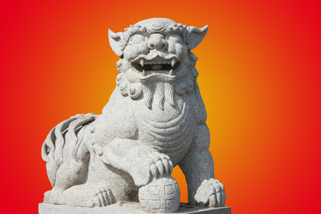 Stone lion statue in a Chinese templeの写真素材