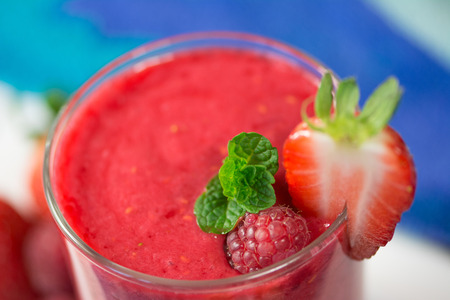 Healthy fresh  delicious homemade raspberry and strawberry smoothieの写真素材