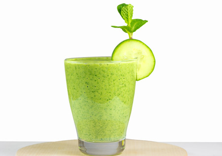Healthy green vegetable  smoothie with apples,spinach,cucumber,limeの写真素材