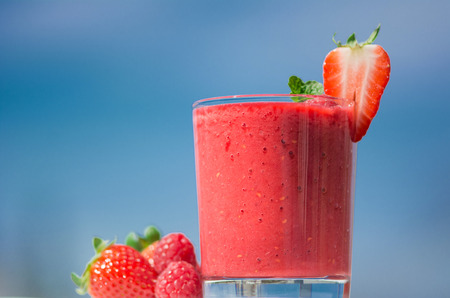 Healthy fresh  delicious homemade raspberry and strawberry smoothieの写真素材