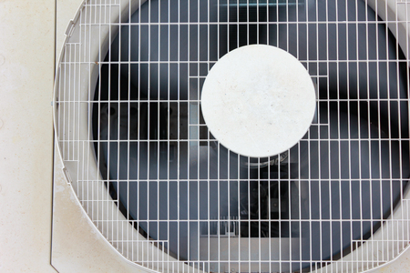 Close-up of fan of air conditioner,top viewの写真素材