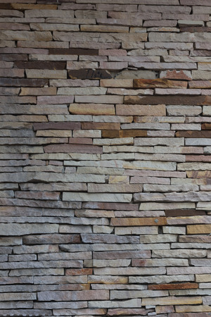 pattern of decorative white slate stone wall surfaceの写真素材