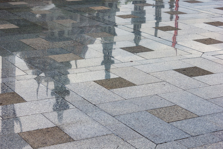 Thai temple reflection in Granite flooring surfaceの写真素材
