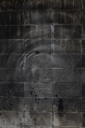 Old brick wall background. Grunge texture. Black wallpaper. Dark surfaceの写真素材