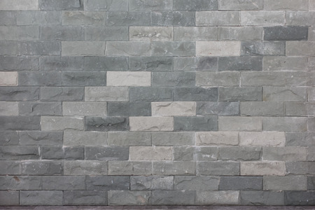 pattern of decorative white slate stone wall surfaceの写真素材