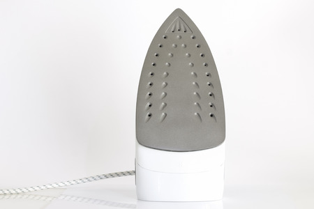 Steam iron isolated on white backgroundの写真素材